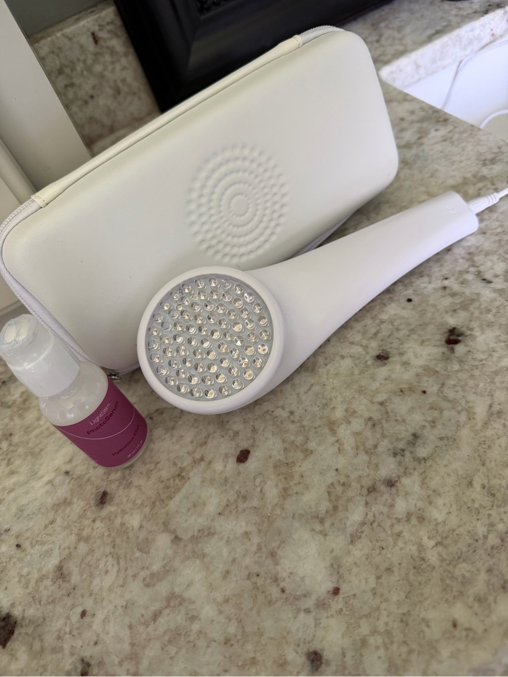 White Handheld LED Therapy Device with Zip Carry Case